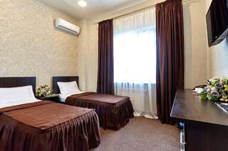 Отель Алтай Краснодар Бюджетный двухместный номер с 2 отдельными кроватями-1